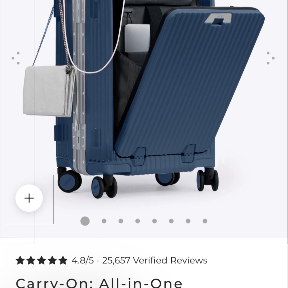 Tumi Blue and Gray Rolling Suitcase